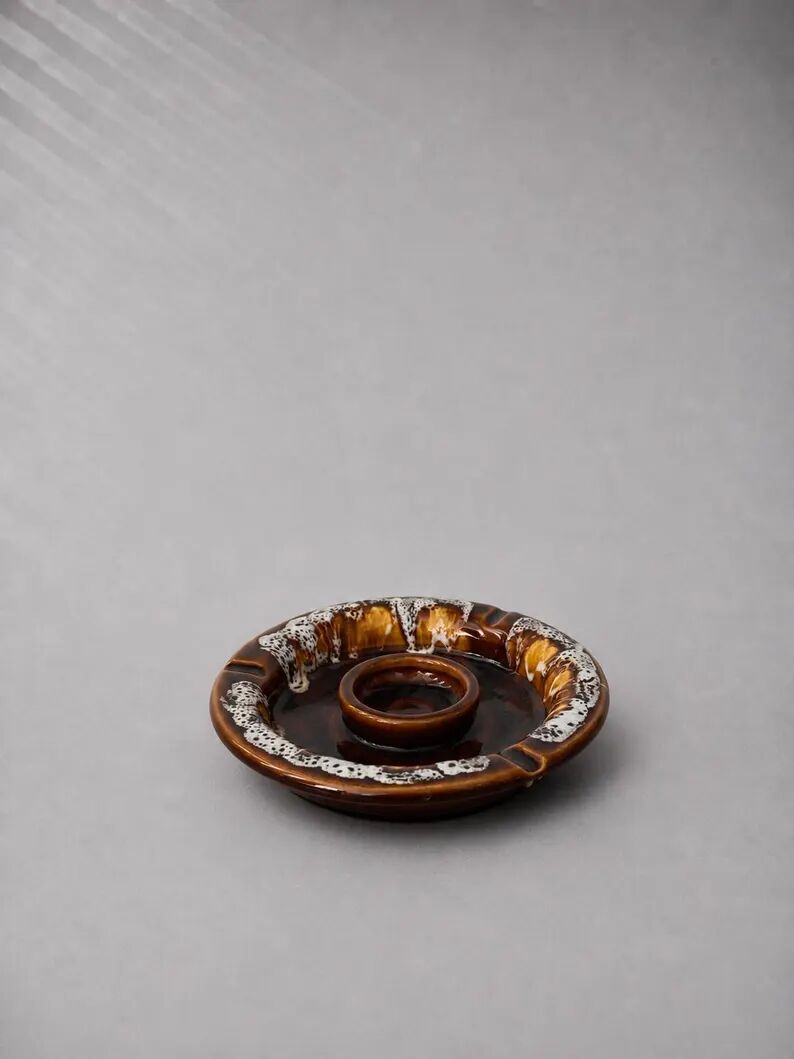 Vintage brown ashtray with drip glaze, 1970s ceramic pottery.