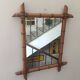 Mirror circa 1950 in bamboo imitation.