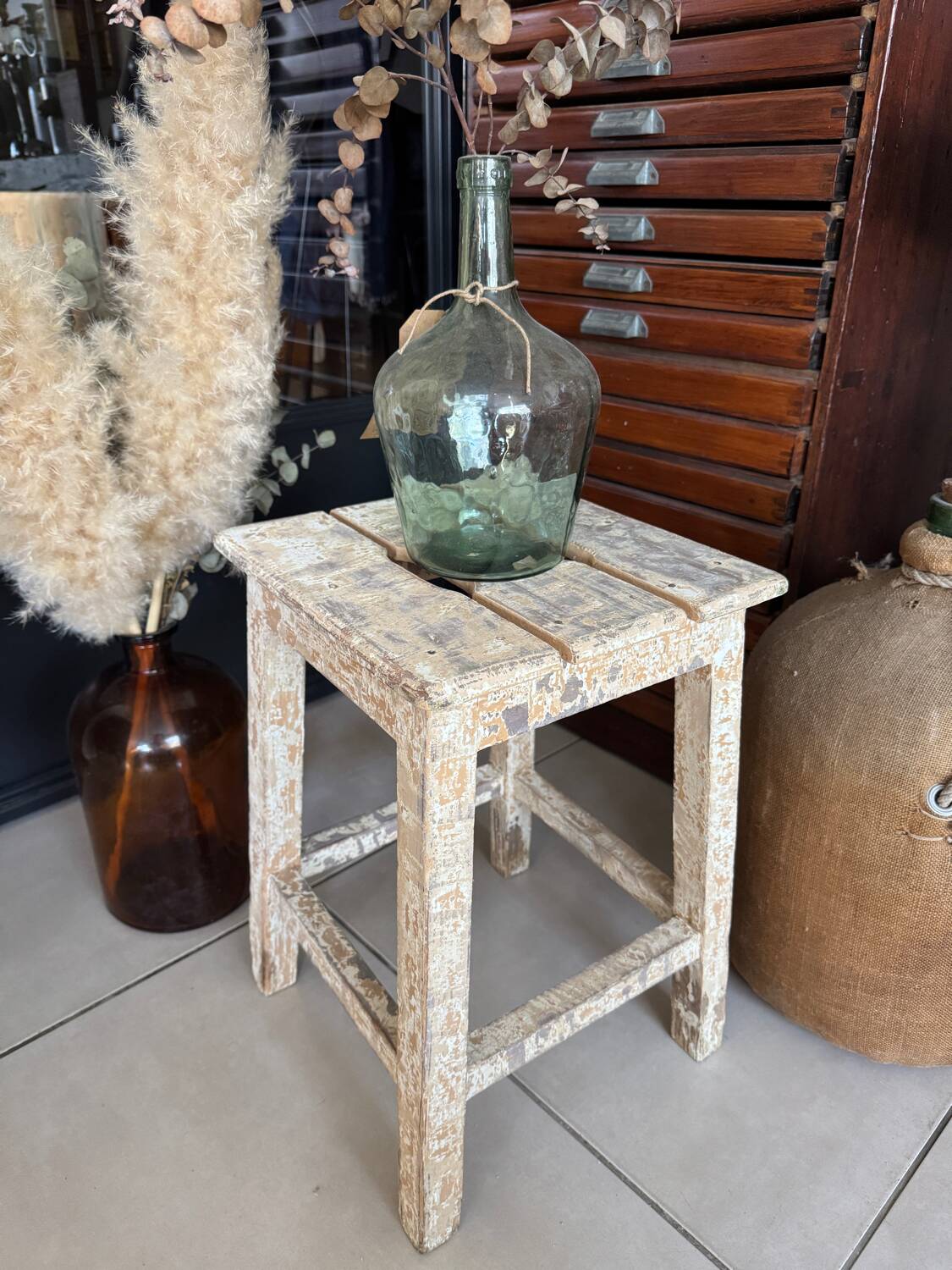 Old wooden stool with square seat