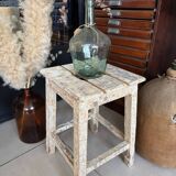 Old wooden stool with square seat