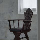 Scandinavian armchair in solid oak with cushion, folk art, early 19th century.