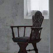 Scandinavian armchair in solid oak with cushion, folk art, early 19th century.
