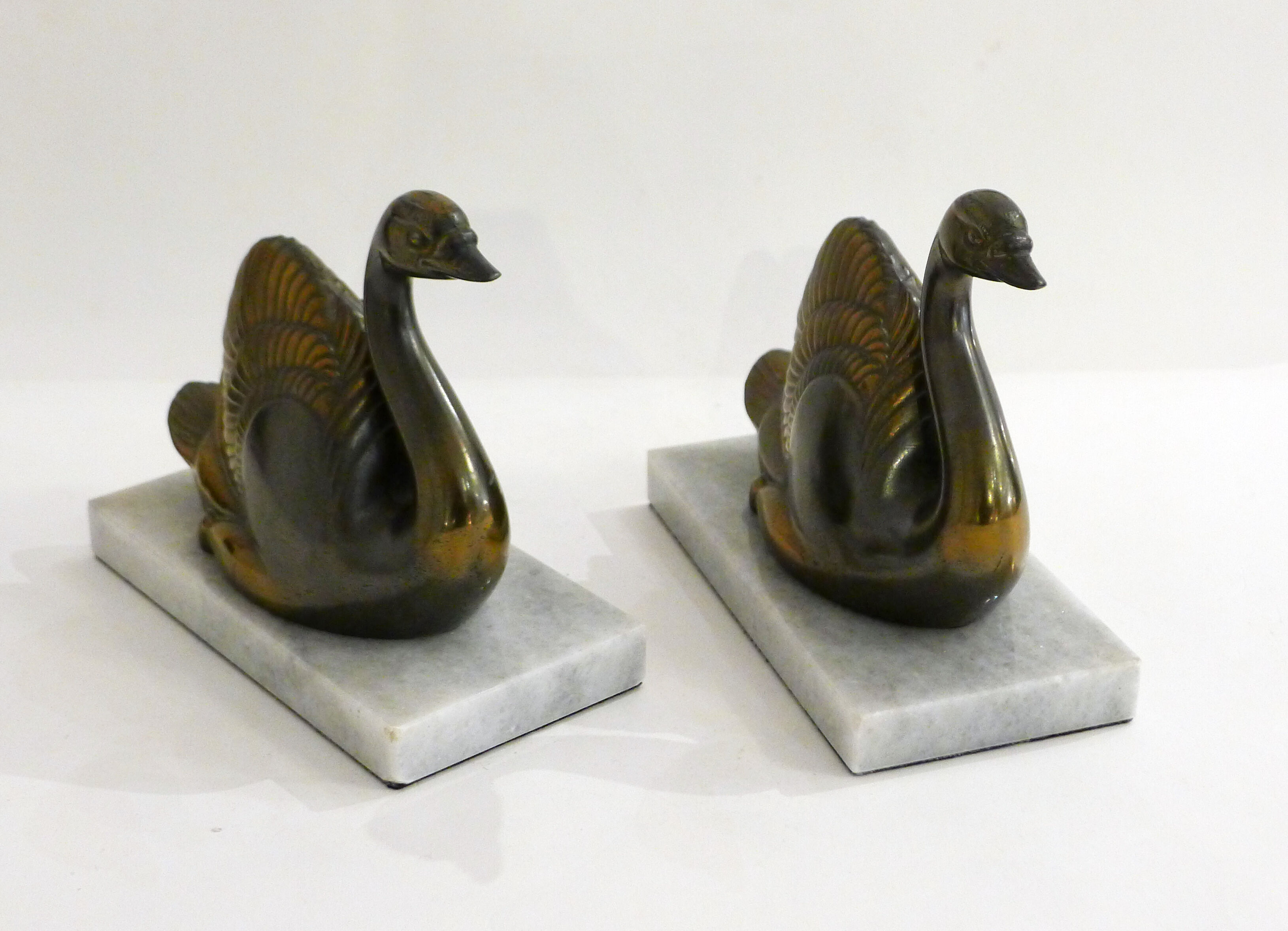 Swan bookends on marble
