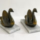 Swan bookends on marble