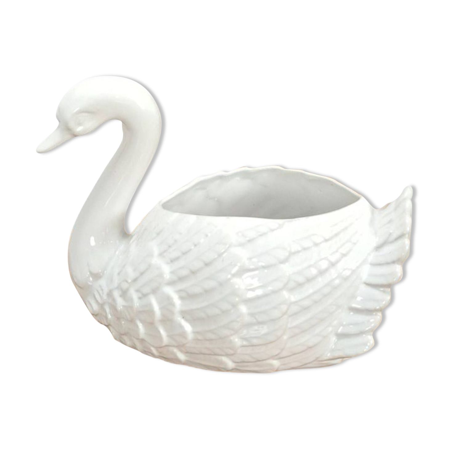 vintage porcelain flower pot in the shape of a swan