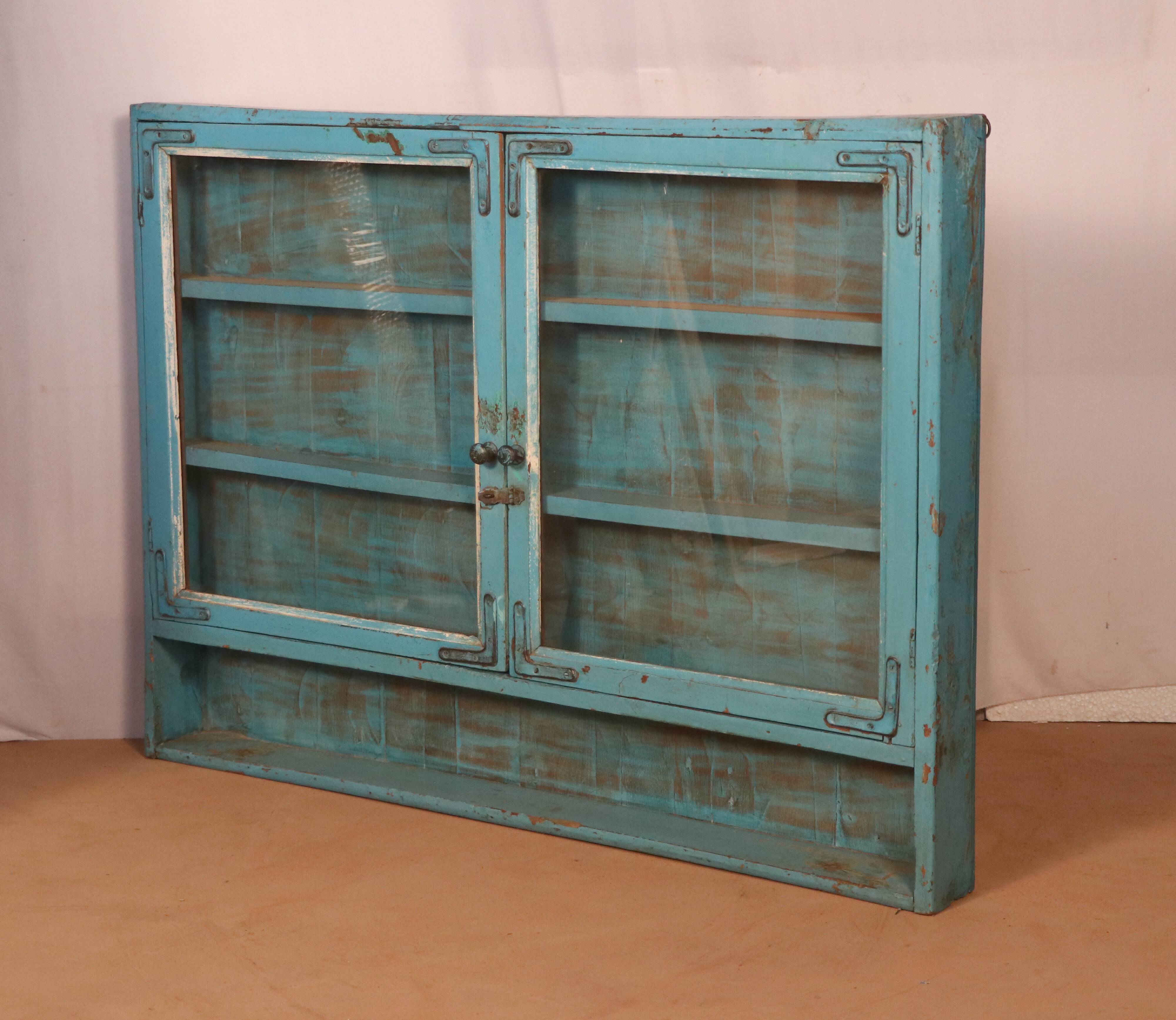 Old showcase in original blue patina Burmese teak