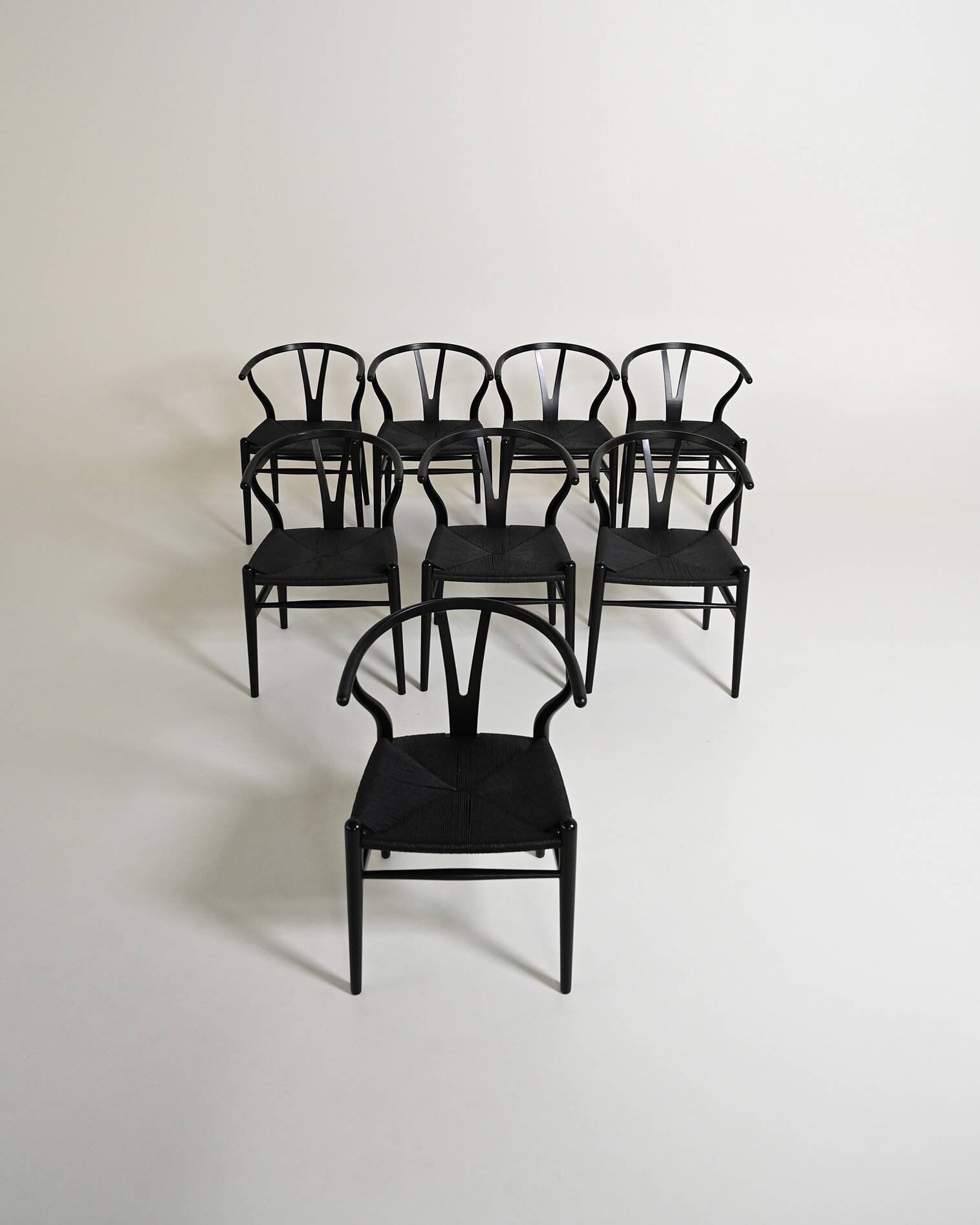 Set of 8 “Wishbone Chair” “CH24” chairs by Hans J. Wegner, 1990