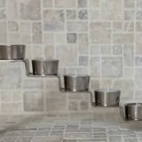 Chrome-plated metal candle holder