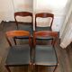 Set of 4 vintage designer chairs in teak and black skai 60's