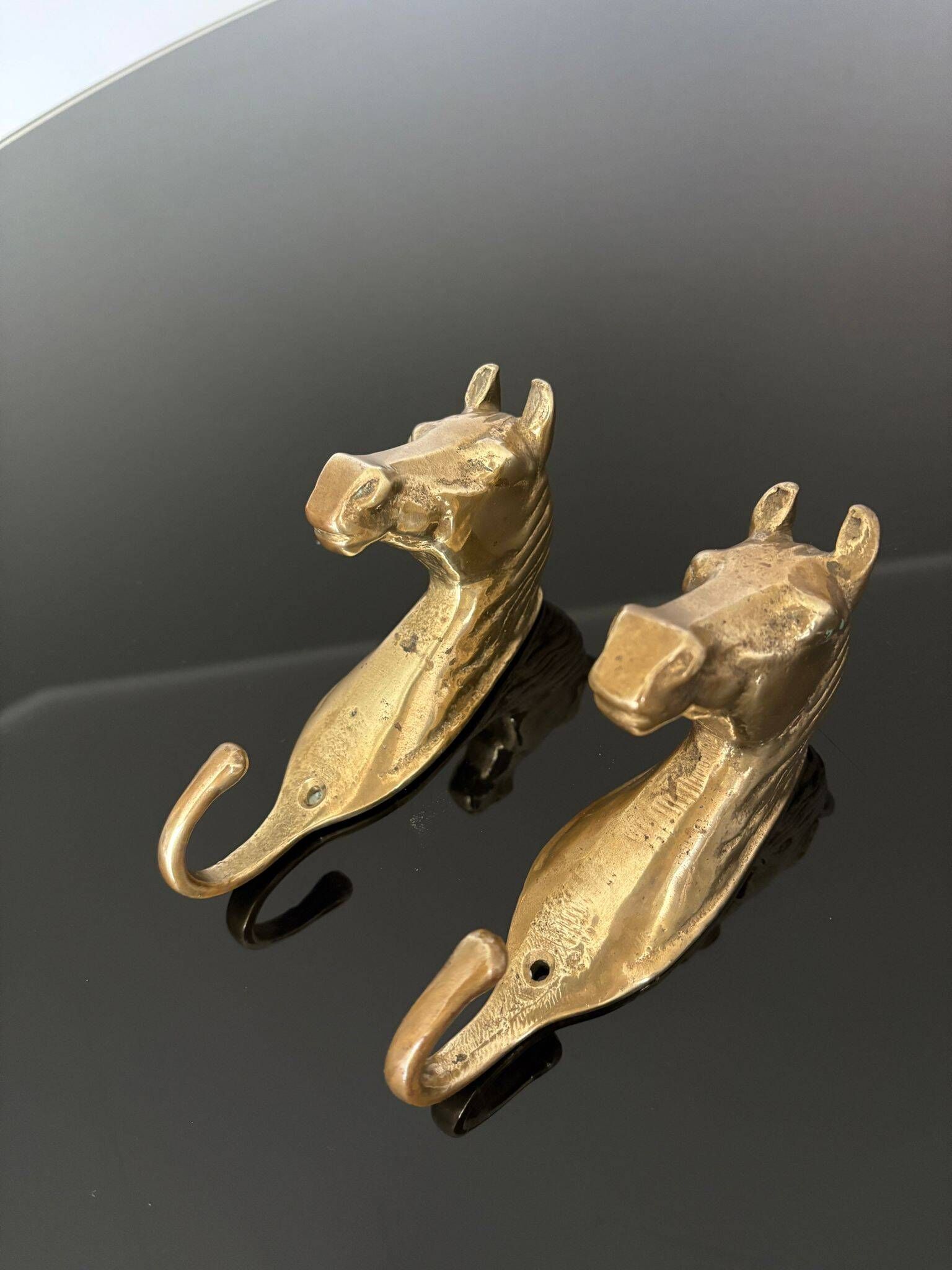 Pair of bronze coat hooks - Italy, 1950s