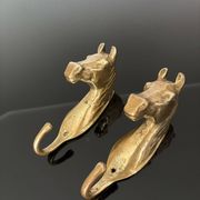 Pair of bronze coat hooks - Italy, 1950s