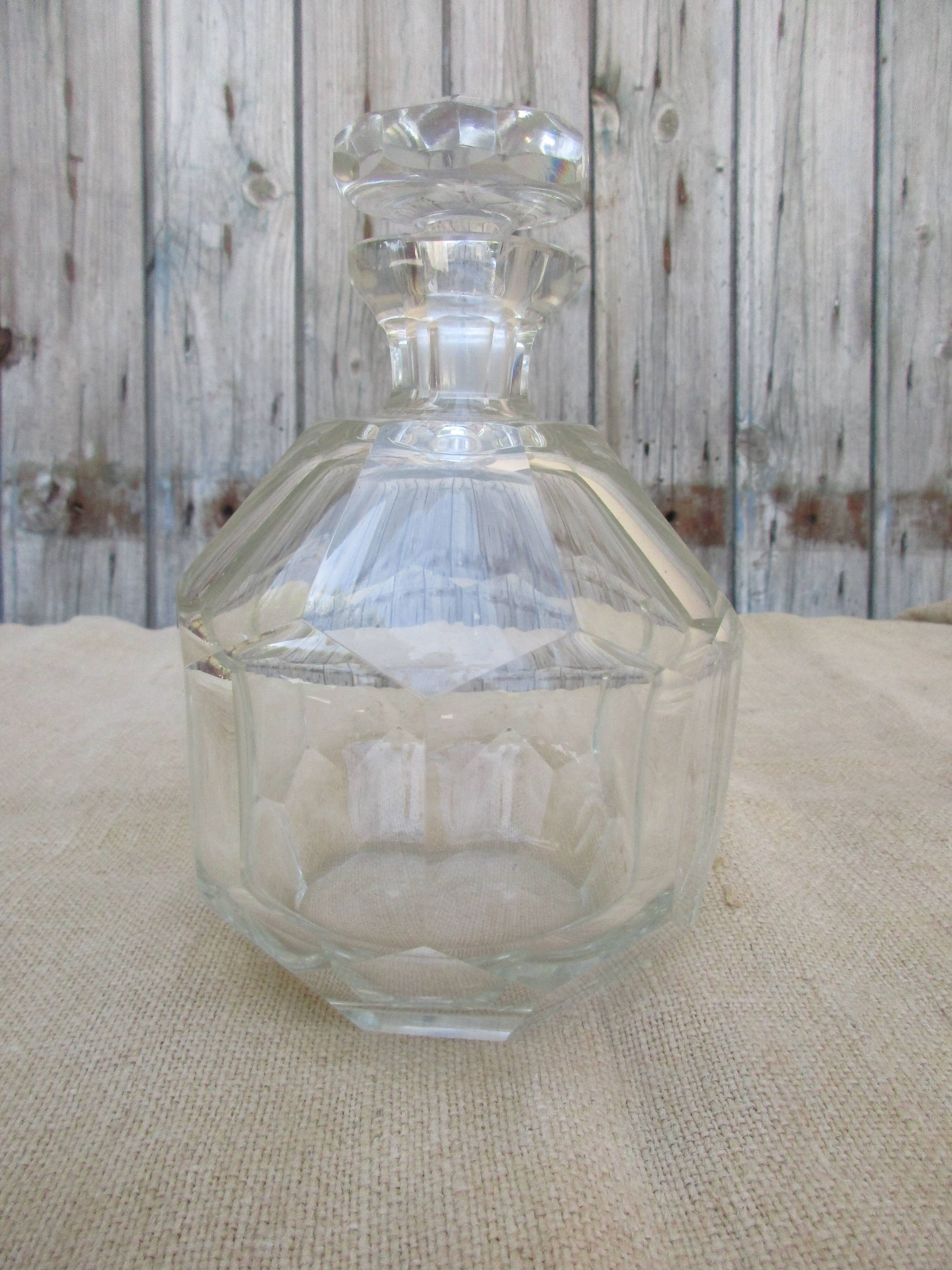 Glass decanter and diamond tip emeri cap