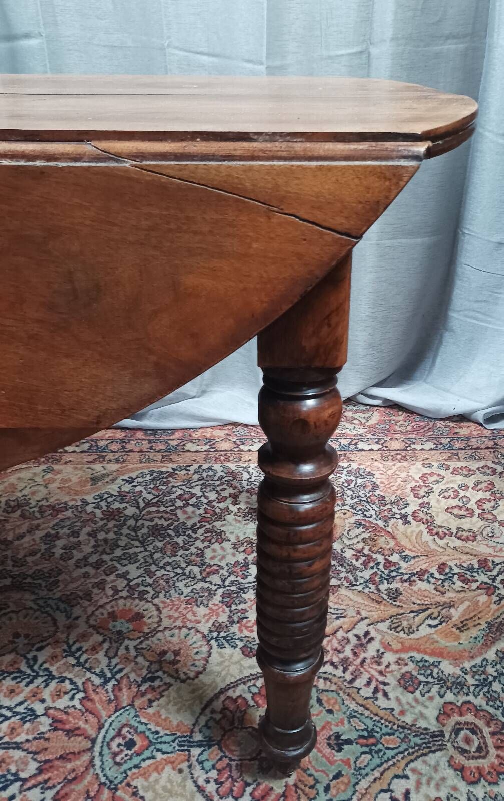 19th-century Louis Philippe walnut drop-leaf table.