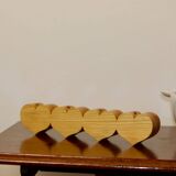 Heart-shaped chandelier made of Swedish pine wood.