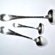 RENEKA Lot of 3 sauce spoons and ladle with crossed ribbon metal bows in silver plate