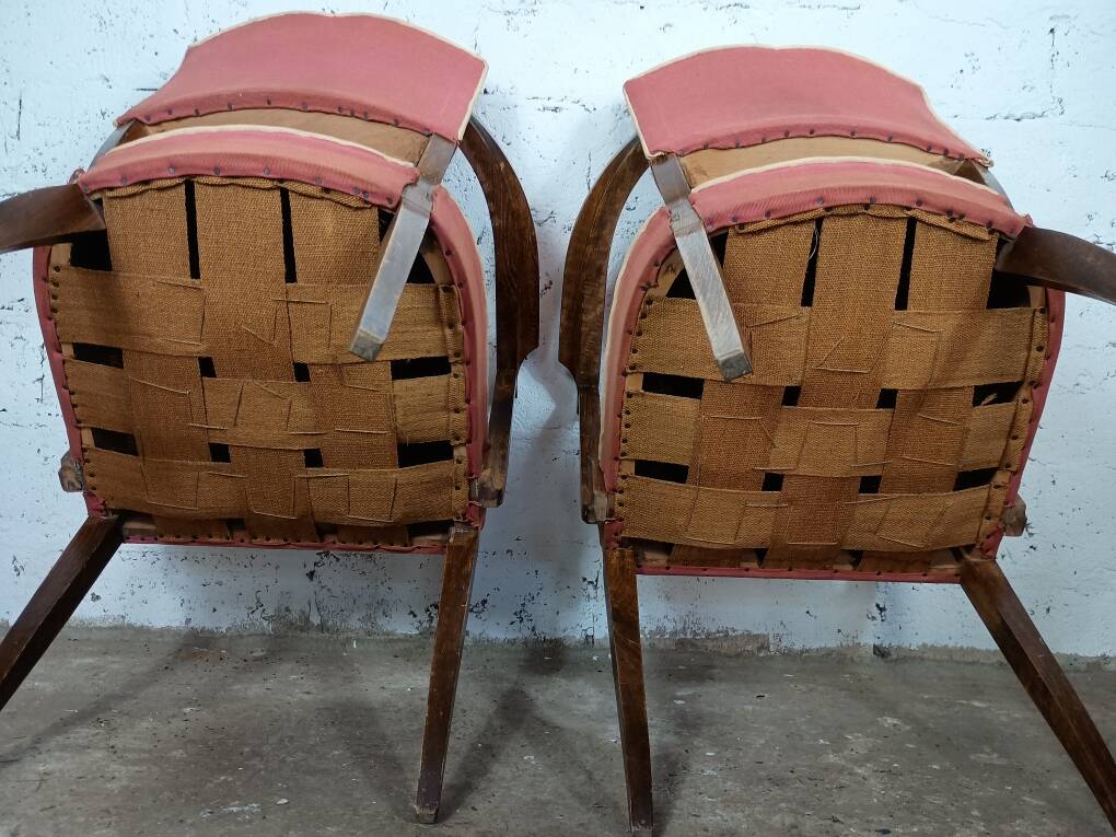 2 pale pink 50s moustache bridge armchairs