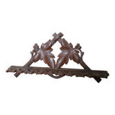 Carved wooden pipe holder