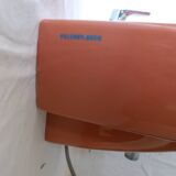 Vintage sink and its orange shelf