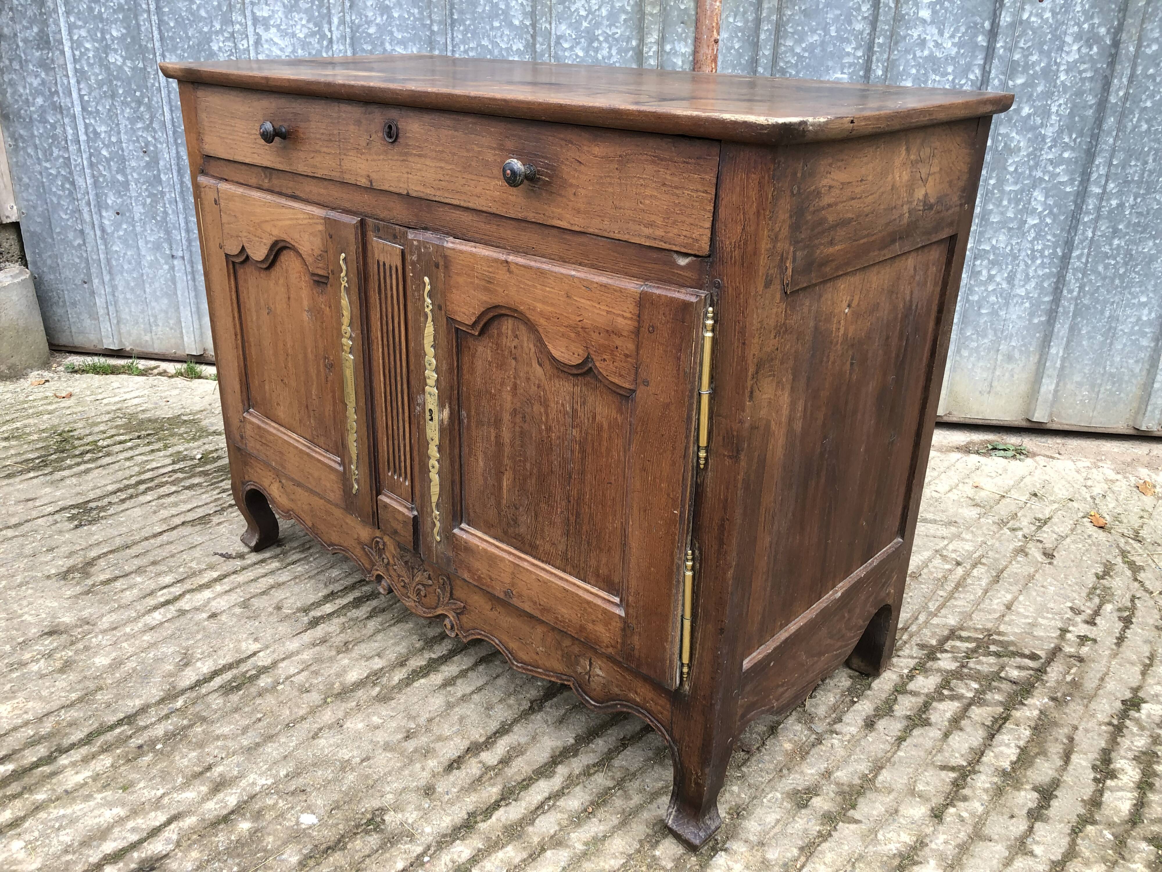 Antique Louis XV low chestnut sideboard with 2 doors and 1 drawer.