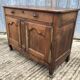 Antique Louis XV low chestnut sideboard with 2 doors and 1 drawer.