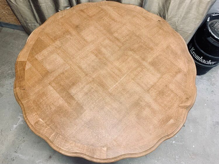 Round solid oak dining table