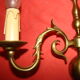Pair of bronze wall lights with 2 arms in "Dutch" style.