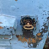 Entrance door in solid oak, cast iron grille, 1930s