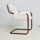 Tubular armchair, fabric suspended seat. Circa 1970