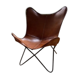 Butterfly armchair in cowhide crust