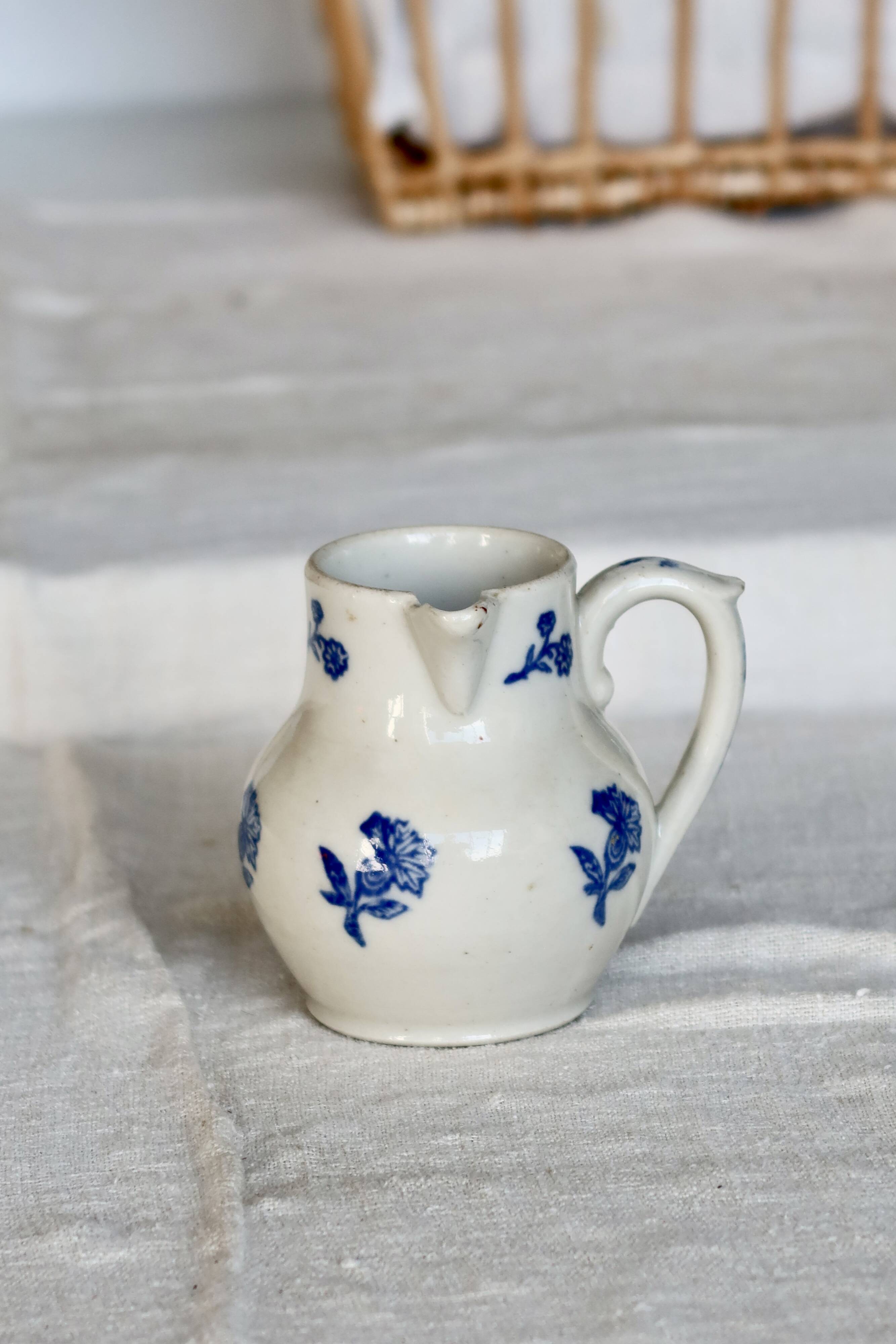 Antique Saint-Uze steel clay pitcher with cobalt blue floral pattern