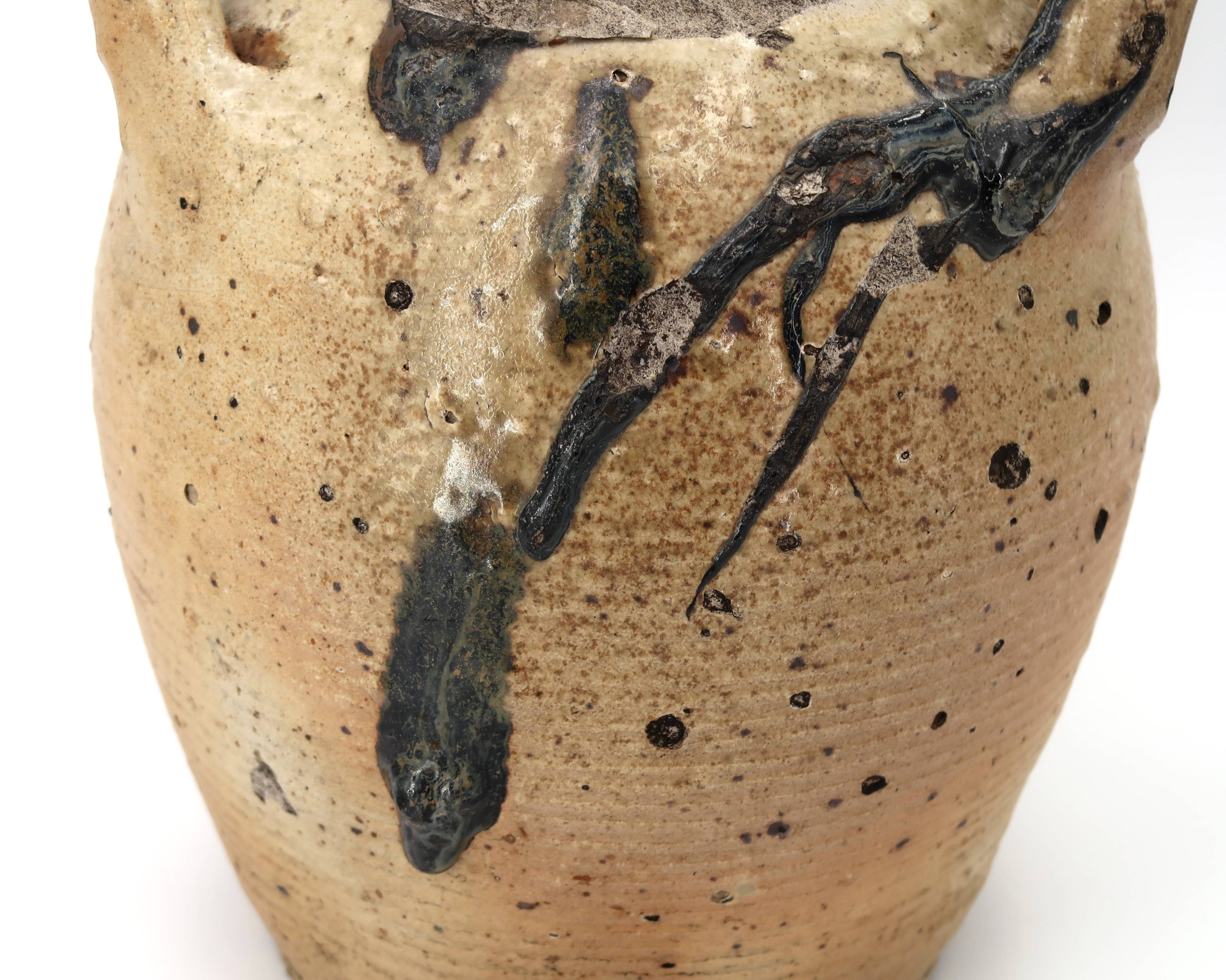 Traditional wabi-sabi stoneware ceramic jar with handles, 1900