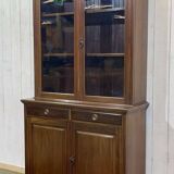 English walnut two-body library from the early 20th century.