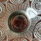 Transparent glass dish on vintage metal stand