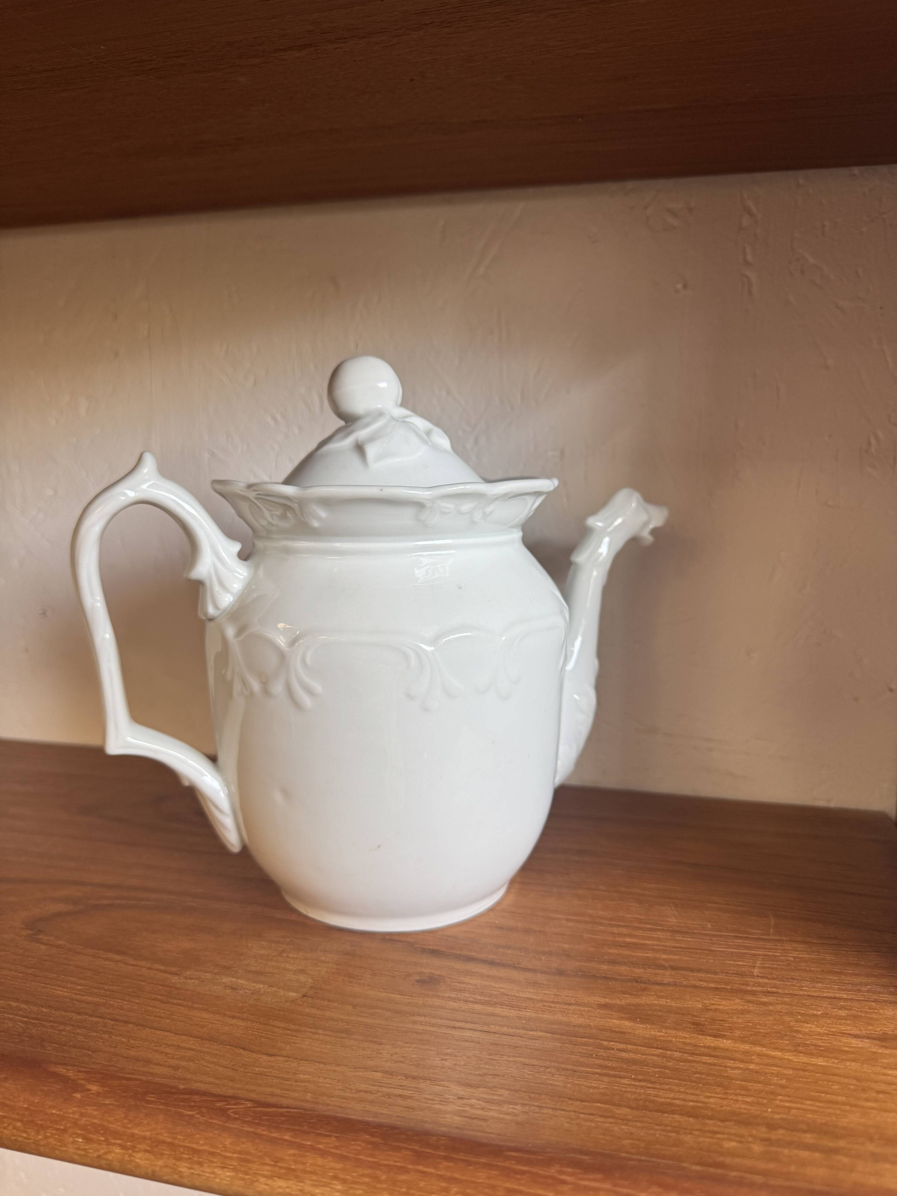 White ceramic teapot
