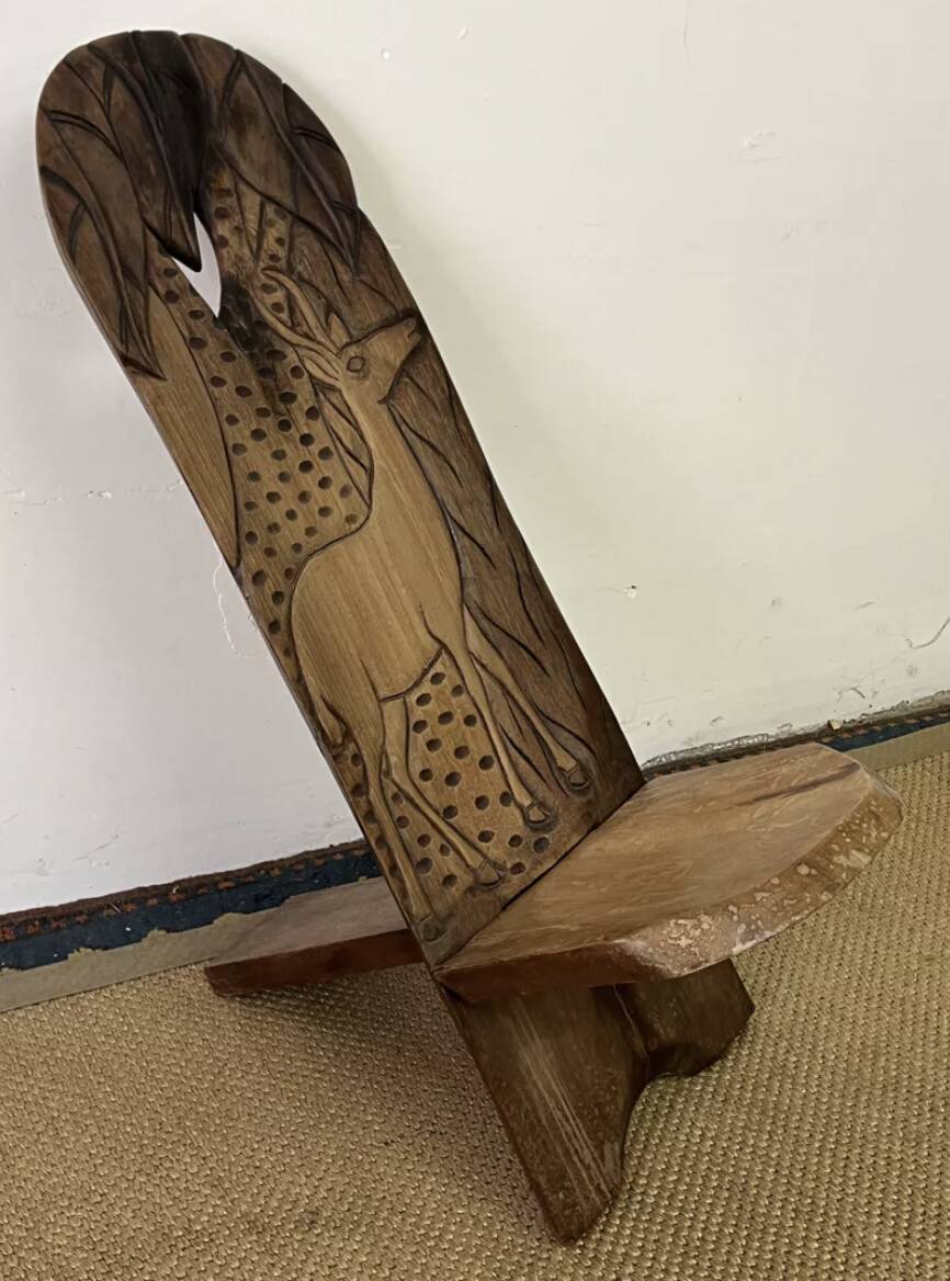 African carved wooden palaver chair