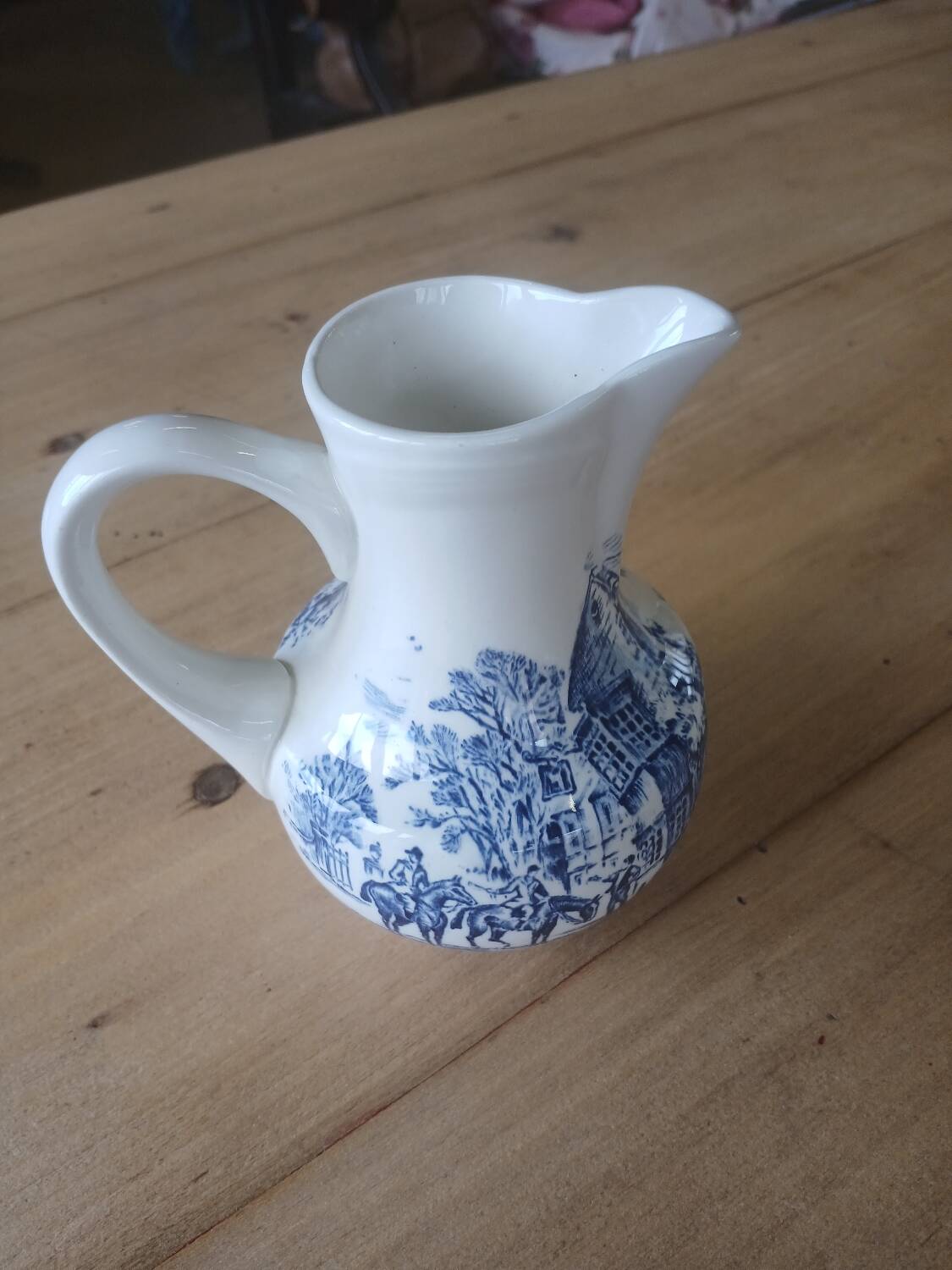 Small old pitcher in iron earth