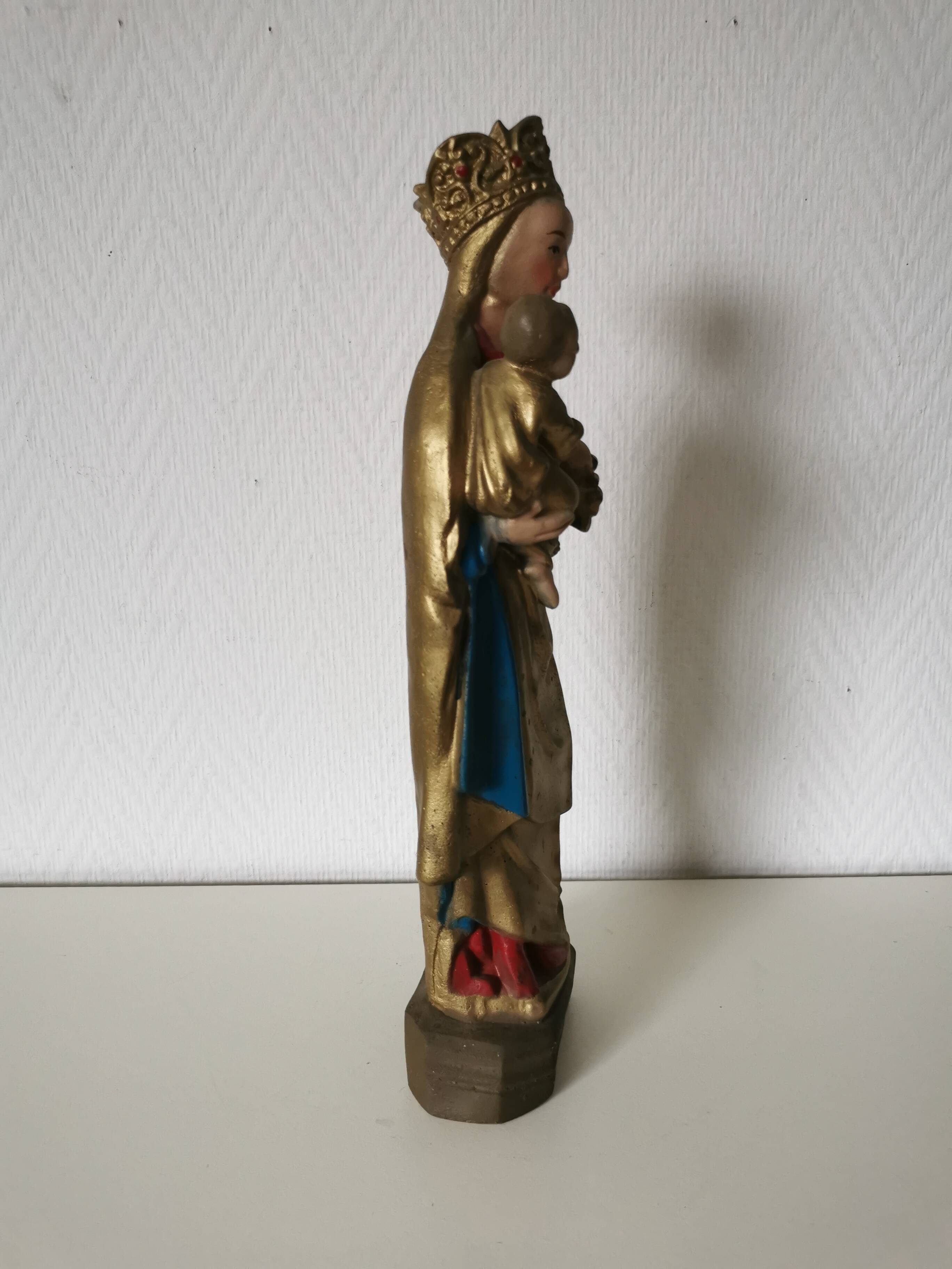 large statue of the Virgin and Child in painted plaster