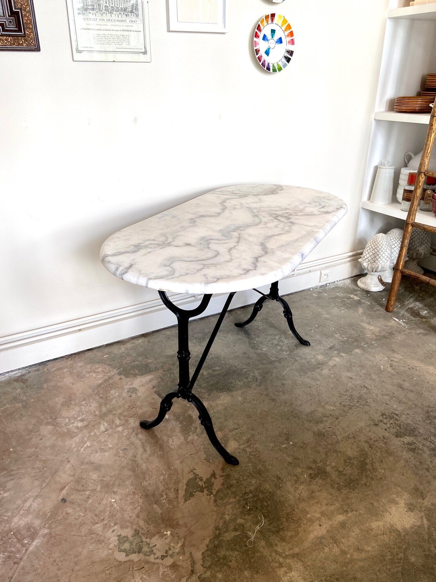 Bistro table in gray marble and cast iron