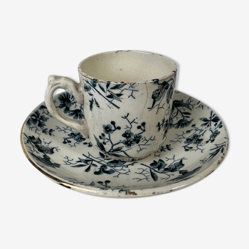 White porcelain cup with blue flowers