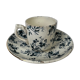 White porcelain cup with blue flowers