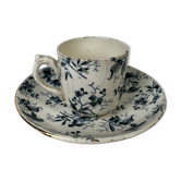 White porcelain cup with blue flowers