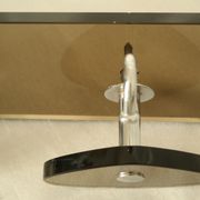 Brown smoked glass coat hook from the 1970s.
