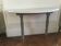 Antique painted half-moon console