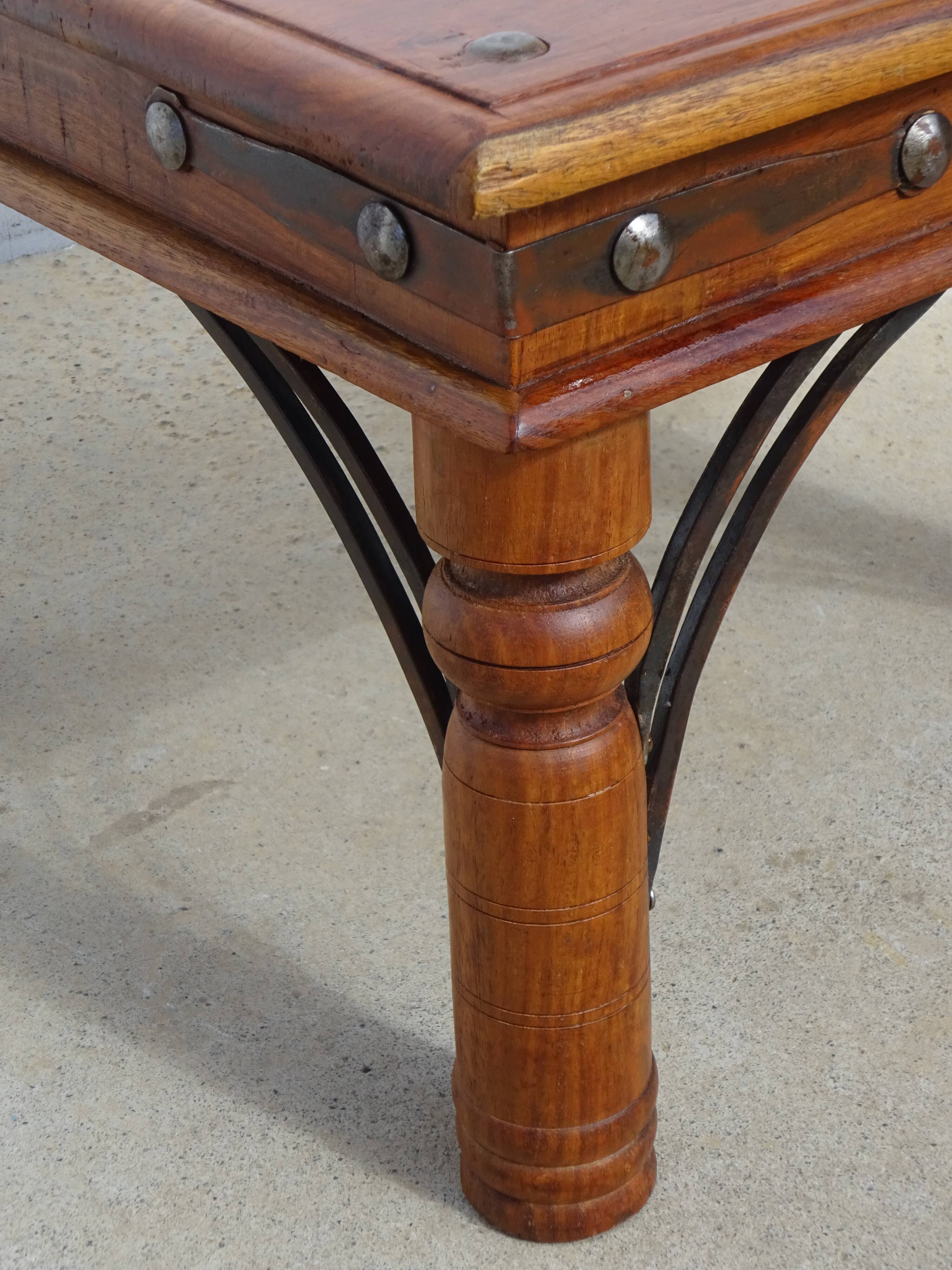 Square coffee table in exotic wood and wrought iron.