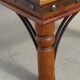 Square coffee table in exotic wood and wrought iron.