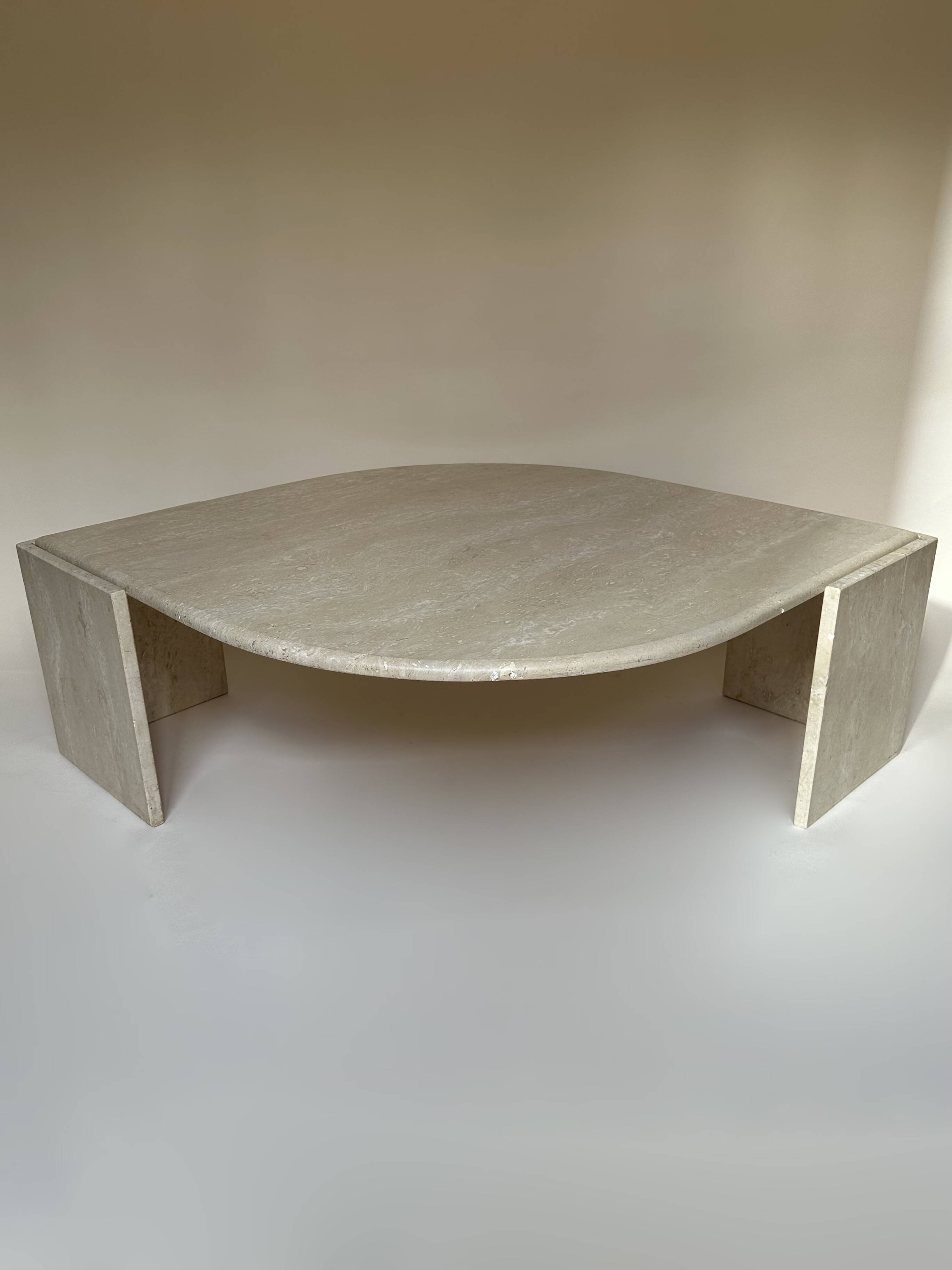 Travertine eye-shaped coffee table