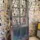 Old glazed wooden door patinated