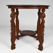 Table basse asiatique sculptée de dragons et de paons, Indonésie, début XXe