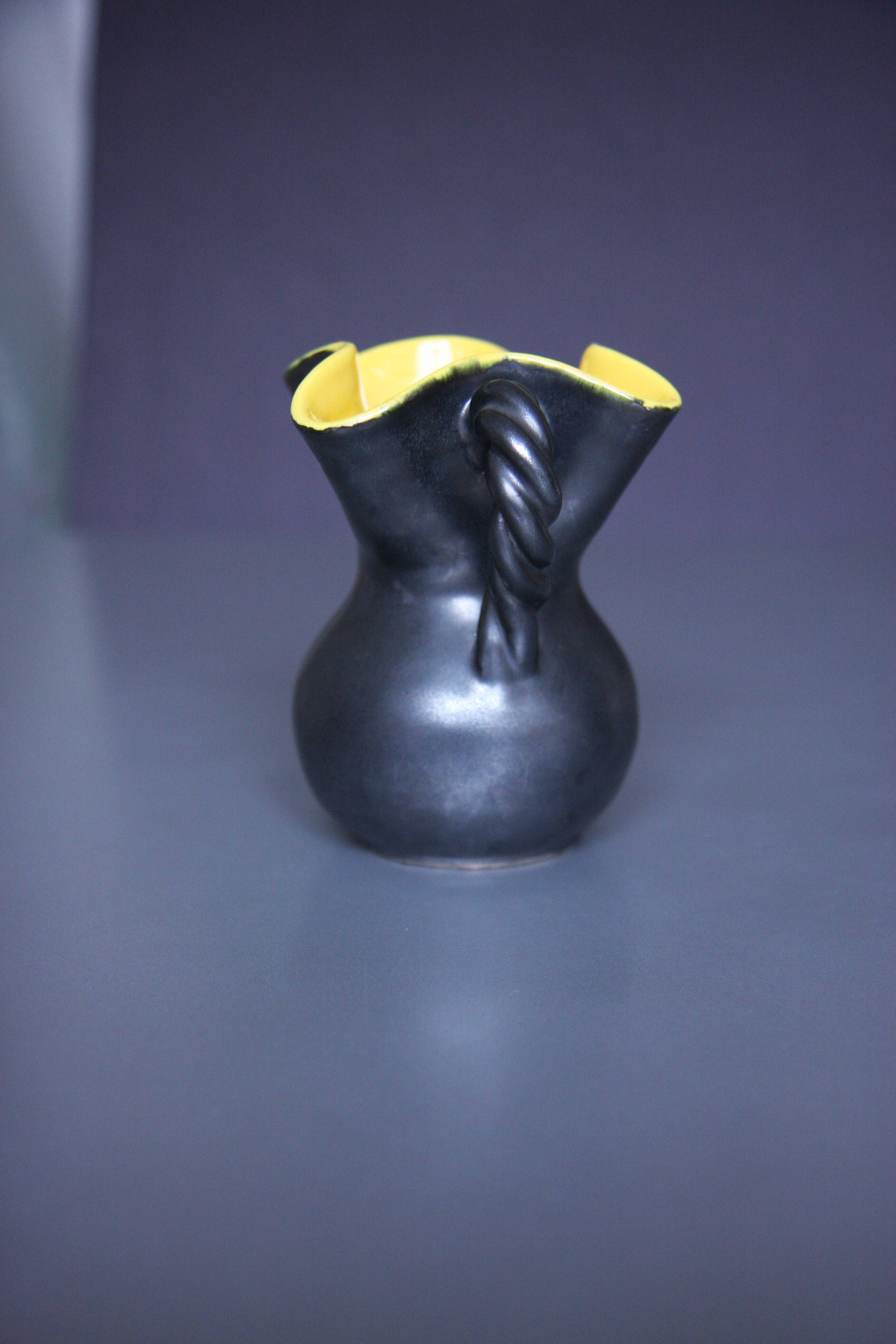Black and yellow vase, Vallauris ceramics, twisted handles.