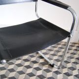 Vintage chrome and faux black leather armchair